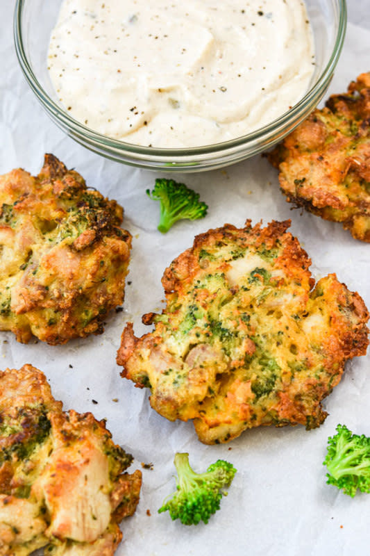 <p>Broccoli cheddar chicken fritters are a go to easy low carb chicken dinner (or reheat for lunch)!</p><p><strong>Get the recipe: <a href="https://mealplanaddict.com/2019/06/broccoli-cheddar-chicken-fritters/" rel="nofollow noopener" target="_blank" data-ylk="slk:Air Fryer Broccoli Cheddar Chicken Fritters;elm:context_link;itc:0;sec:content-canvas" class="link rapid-noclick-resp">Air Fryer Broccoli Cheddar Chicken Fritters</a></strong></p>