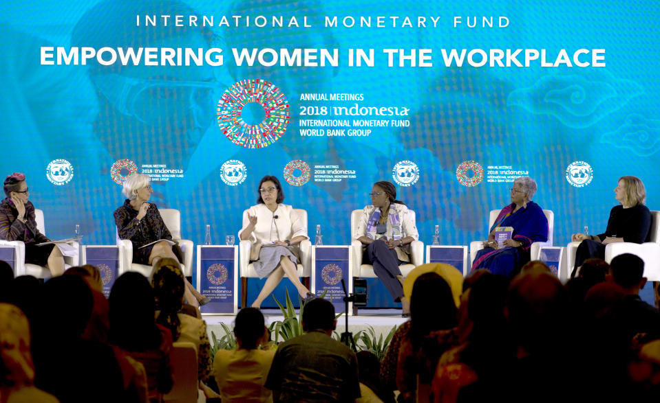 From left to right, Indonesian television journalist Rosianna Silalahi, Managing Director of International Monetary Fund (IMF) Christine Lagarde, Indonesia’s Finance Minister Sri Mulyani, Executive Secretary of the United Nations Economic Commission for Africa Vera Songwe, Executive Director of the International Women’s Rights Action Watch, Asia Pacific, Priyanthi Fernando, and Senior Deputy Governor, Bank of Canada Carolyn Wilkins talk during Empowering Women in the Workplace seminar panelists at International Monetary Fund-World Bank meeting in Bali, Indonesia Tuesday, Oct. 9, 2018. (AP Photo/Firdia Lisnawati)