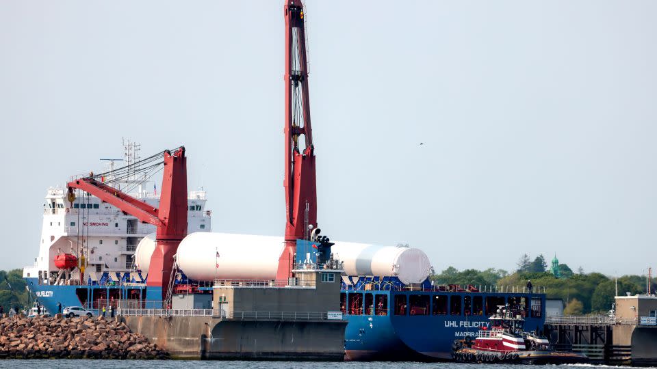 The first shipment of wind turbine parts for the Vineyard Wind farm travels through the New Bedford hurricane barrier in Massachusetts in 2023. - Matthew J. Lee/The Boston Globe/Getty Images/File