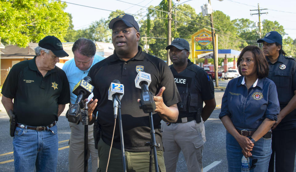 Baton Rouge Police Chief Murphy Paul speaks to reporters in Baton Rouge, La., Sunday, April 26, 2020. A shooting has left one police officer dead and a wounded colleague fighting for life, authorities said, adding a suspect was in custody after an hourslong standoff at a home. Paul told The Advocate the officers were shot in the northern part of the city, and one of the officers later died. (Travis Spradling/The Advocate via AP)