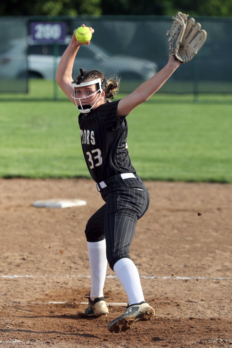 Watkins Memorial's Carsyn Cassady delivers a pitch during a Division I district final game against Westerville Central on May 20 at Pickerington High School Central.