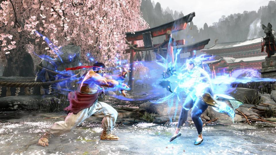 Ryu hits Chun-Li with a Hadouken attack