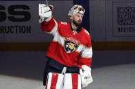 Florida Panthers goaltender Chris Driedger waves to the crowd after an NHL hockey game against the Tampa Bay Lightning, Monday, May 10, 2021, in Sunrise, Fla. The Panthers won 4-0. (AP Photo/Lynne Sladky)