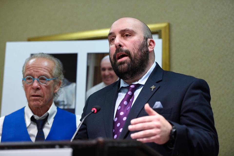 John Bellocchio, right, announces his lawsuit against the Archdiocese of Newark for sexual abuse he suffered as a teenager by Cardinal Theodore E. McCarrick, who was the Archbishop of Newark at the time. Bellocchio, with attorney Jeff Anderson, left, held the press conference on Monday, Dec. 2, 2019, in Newark. 
