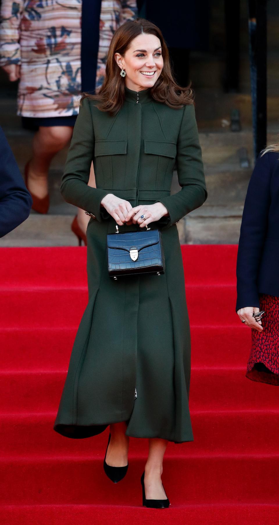 Kate Middleton wears a green Alexander McQueen coat dress in 2020.