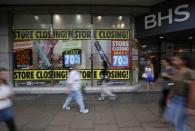 Pedestrians walk past a BHS store in London, Britain July 25, 2016. REUTERS/Neil Hall