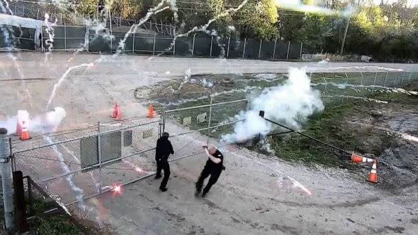 PHOTO: Protesters launch fireworks against members of the police at the construction site of a police training center, after a demonstration at the property led to clashes, in Atlanta, March 5, 2023, in a still from a social media video. (Atlanta Police Dept. via Reuters)