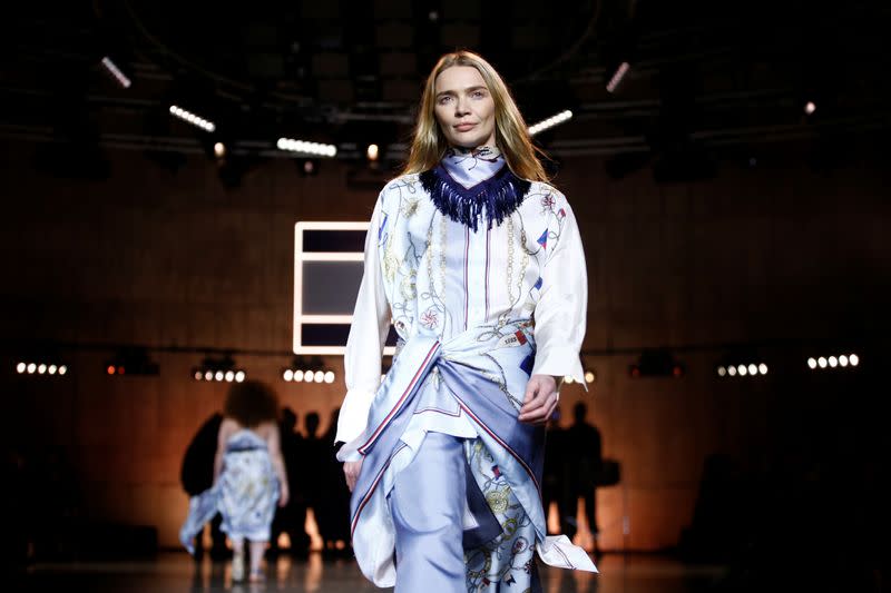 Model Jodie Kidd presents a creation during the Tommy Hilfiger 'TOMMYNOW Spring 2020' show during London Fashion Week in London