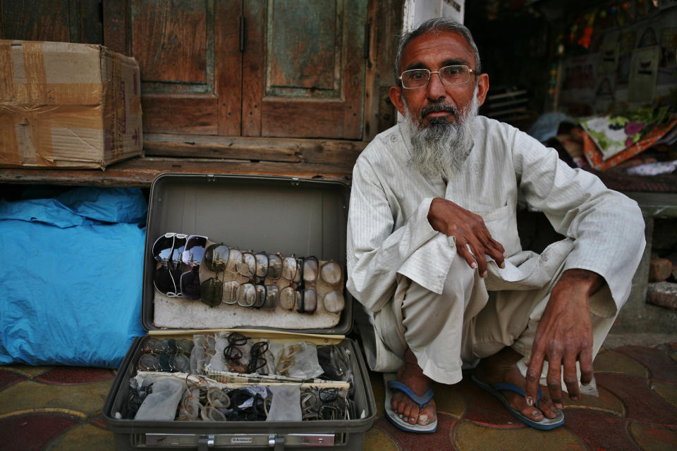 February 21: Street vendor selling glasses, Ahmedabad, India by <a href="http://www.flickr.com/photos/95012188@N02/12236511564" rel="nofollow noopener" target="_blank" data-ylk="slk:sandeepachetan.com;elm:context_link;itc:0;sec:content-canvas" class="link ">sandeepachetan.com</a>. 'We saw him near Jami Masjid selling new and old used spectacles. Recycling is very common even in big cities and many poor people can save money by opting for them.'