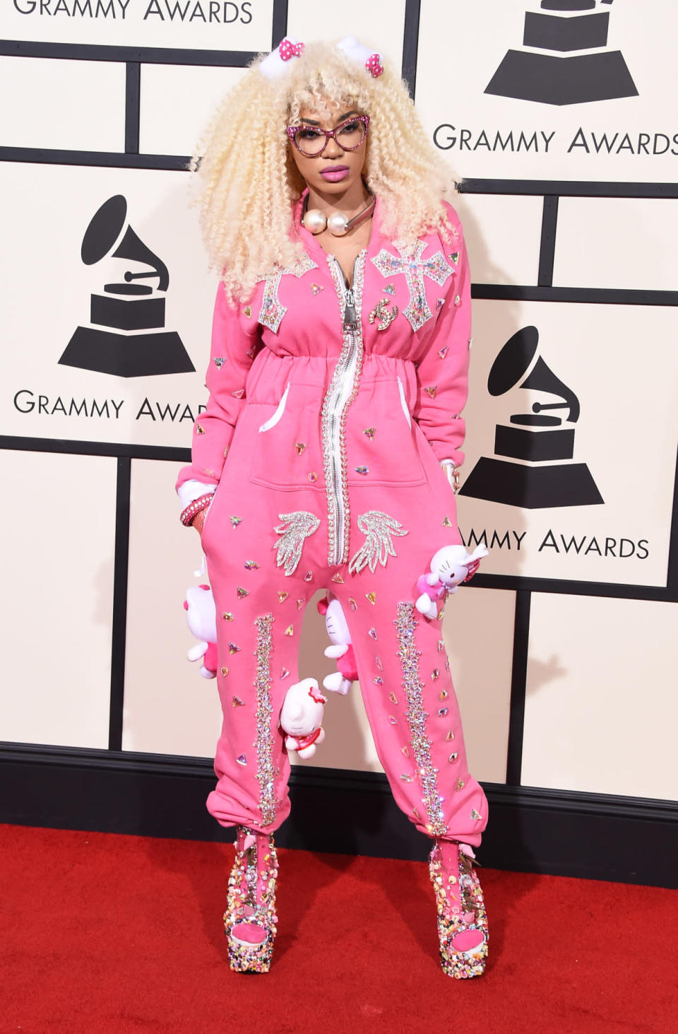 Outrageous: Dencia in a pink sweatsuit covered in Hello Kitty plush toys at the 58th Grammy Awards at Staples Center in Los Angeles, California, on February 15, 2016.