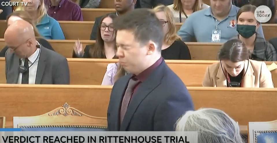 Kyle Rittenhouse becomes emotional as a not guilty verdict is read in his trial in Kenosha, Wisconsin, on Nov. 19, 2021.