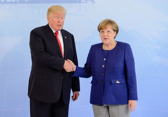 HAMBURG, GERMANY - JULY 06: German Chancellor Angela Merkel receives U.S. President Donald Trump in the Hotel Atlantic, on the eve of the G20 summit, for bilateral talks on July 6, 2017 in Hamburg, Germany. Leaders of the G20 group of nations are meeting for the July 7-8 summit. Topics high on the agenda for the summit include climate policy and development programs for African economies.  (Photo by Jens Schluter - Pool/Getty Images)