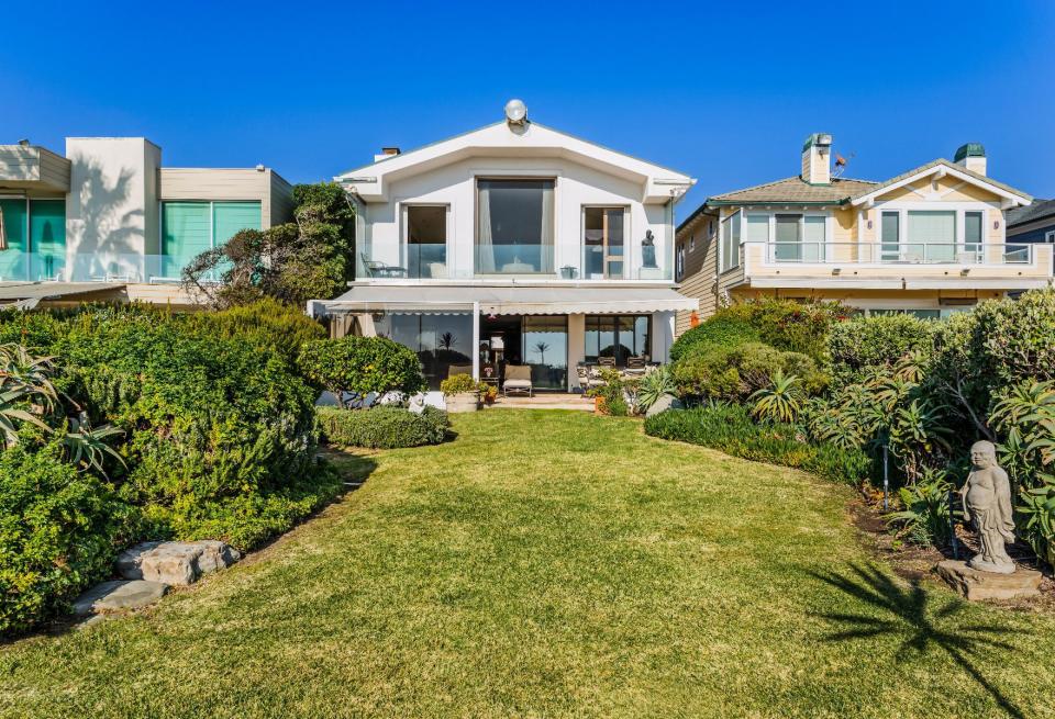 <p>A two-story home that Frank Sinatra built on the beach in Malibu, California is on the market for the first time. The 5,800-square-foot house is where Sinatra and his fourth wife, Barbara, <a rel="nofollow noopener" href="https://www.latimes.com/business/realestate/hot-property/la-fi-hotprop-frank-sinatra-20181128-story.html" target="_blank" data-ylk="slk:regularly hosted;elm:context_link;itc:0;sec:content-canvas" class="link ">regularly hosted</a> Hollywood stars like Jack Lemmon, Gregory Peck, and Dick Van Dyke. Scroll down for a look at the property, which is being offered for $12.9 million. </p>