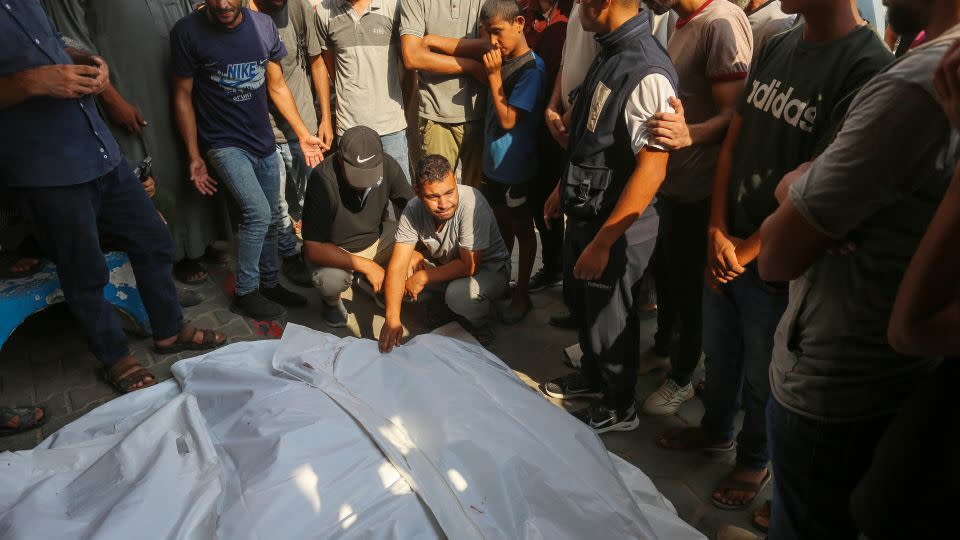 Bodies of Palestinian, including children, are brought to al-Aqsa Martyrs Hospital after Israeli attack on Al-Qashtat family house in Deir al-Balah, Gaza on July 27, 2024. - Ashraf Amra/Anadolu Agency/Getty Images