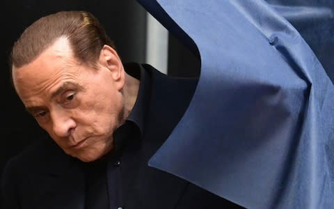 Silvio Berlusconi, Italy's former prime minister, was convicted of tax fraud - Credit: Miguel Medina/AFP