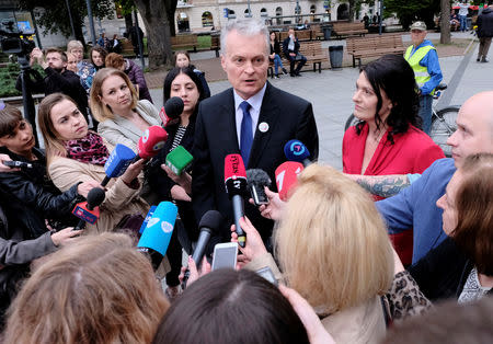 Presidential candidate Gitanas Nauseda speaks to the media during the second round of Lithuanian presidential election in Vilnius, Lithuania May 26, 2019. REUTERS/Ints Kalnins