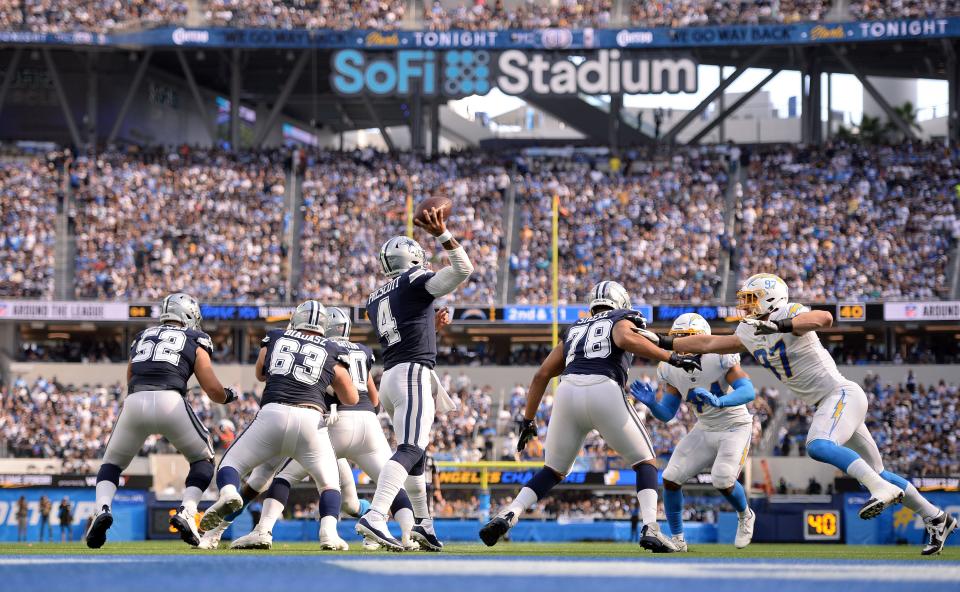 Dak Prescott throws a pass against the Los Angeles Chargers at SoFi Stadium.