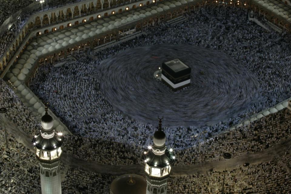 Hajj pilgrims in Mecca, Saudi Arabia, crowd inside the massive Grand Mosque and flood the surrounding streets