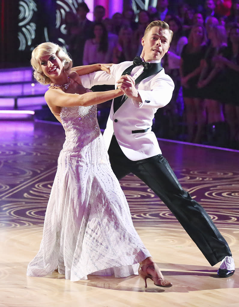 In Week 5, Kellie and Derek's foxtrot featured old Hollywood glam, as the country star sported a bobbed blond wig and a sparkly evening gown. Kellie told <a href="http://www.theboot.com/2013/04/16/kellie-pickler-dancing-with-the-stars-week-5-foxtrot/" rel="nofollow noopener" target="_blank" data-ylk="slk:the Boot;elm:context_link;itc:0;sec:content-canvas" class="link ">the Boot</a> she loved the "custom-made, couture, beautiful outfits" she wore on the show. "The wardrobe team here is unbelievable, and they make everything by hand," she said, noting her Hollywood starlet ensemble. "This is the most clothes they've given me all season!"