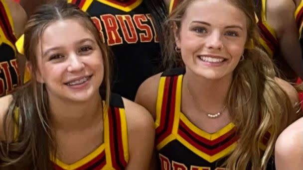 PHOTO: Caroline Gill and Maggie Dunn in a photo posted to the Brusly High School cheerleading Facebook page. (Brusly High School Cheerleading/Facebook)