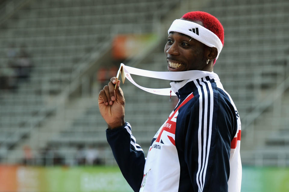 BARCELONA, SPAIN - JULY 30: Phillips Idowu of Great Britain receives the gold medal in the Mens Triple Jump during day four of the 20th European Athletics Championships at the Olympic Stadium on July 30, 2010 in Barcelona, Spain. (Photo by Jasper Juinen/Getty Images)