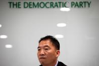 Wu Chi Wai, Chairperson of the Democratic Party attends a news conference after the local district council election in Hong Kong