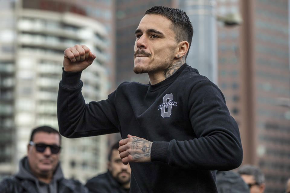 Australian boxer George Kambosos gestures during a public training session at Federation Square in Melbourne, Australia, Thursday, June 2, 2022. U.S.-based Australian boxer Kambosos will put his WBA, IBF and WBO belts on the line on Sunday at Melbourne's Marvel Stadium to fight American Devin Haney. (Diego Fedele/AAP Image via AP)