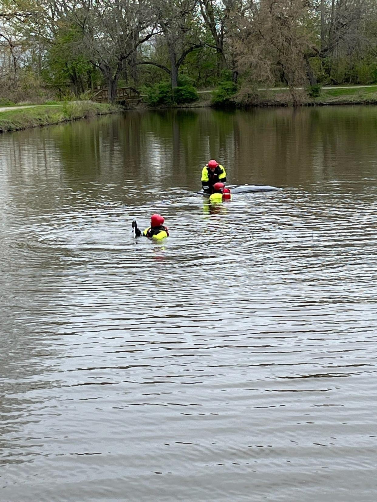 The Canton Fire Department water rescue team responded to Cook's Lagoon on Sunday morning to a report of an SUV submerged in the pond. There was no one in the vehicle, which had been reported stolen Saturday in Plain Township.