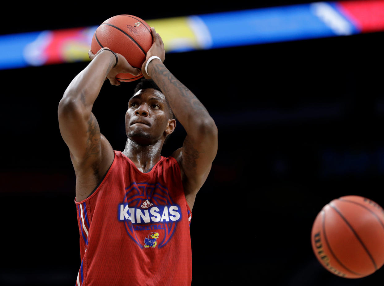 Kansas forward Silvio De Sousa shoots during a practice session for the Final Four NCAA college basketball tournament, Friday, March 30, 2018, in San Antonio. (AP Photo/David J. Phillip)