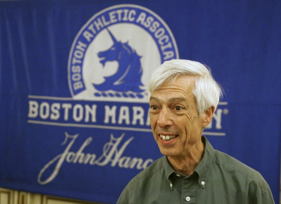 FILE - In this April 13, 2017, file photo, Ben Beach arrives at a media availability at the Copley Plaza Hotel near the Boston Marathon finish line in Boston. Ben Beach has experienced a little bit of everything while running in a record 53 consecutive Boston Marathons — from New England’s unpredictable weather to a diagnosis with dystonia to the 2013 bombing to last year’s pandemic disruption. (AP Photo/Stephan Savoia, File)