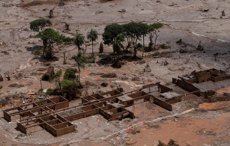 FILE PHOTO: The debris of the municipal school of Bento Rodrigues district, which was covered with mud after a dam owned by Vale SA and BHP Billiton Ltd burst, is pictured in Mariana