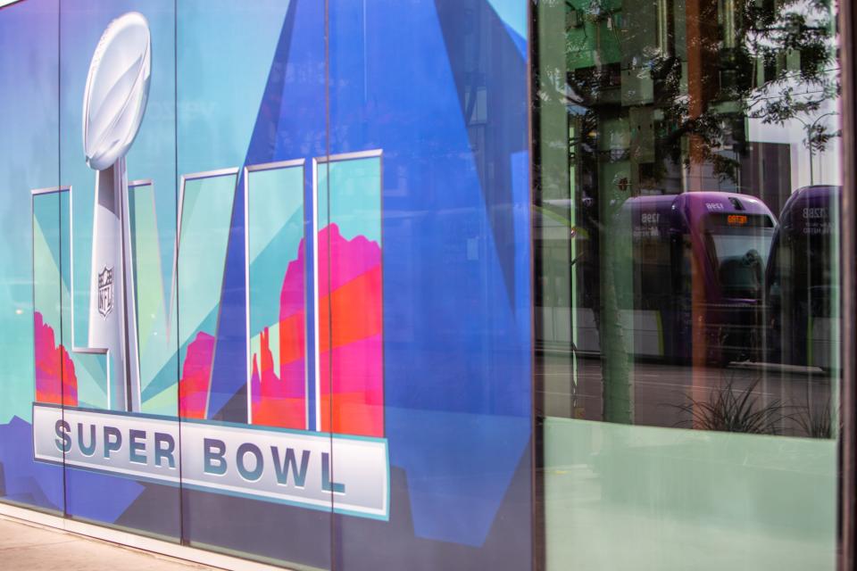 Signs advertising Super Bowl 57 are seen around downtown Phoenix on Feb. 3, 2023.