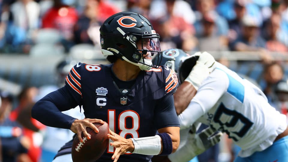 Williams drops back to pass during the second half against the Titans. - Mike Dinovo/USA Today/Reuters