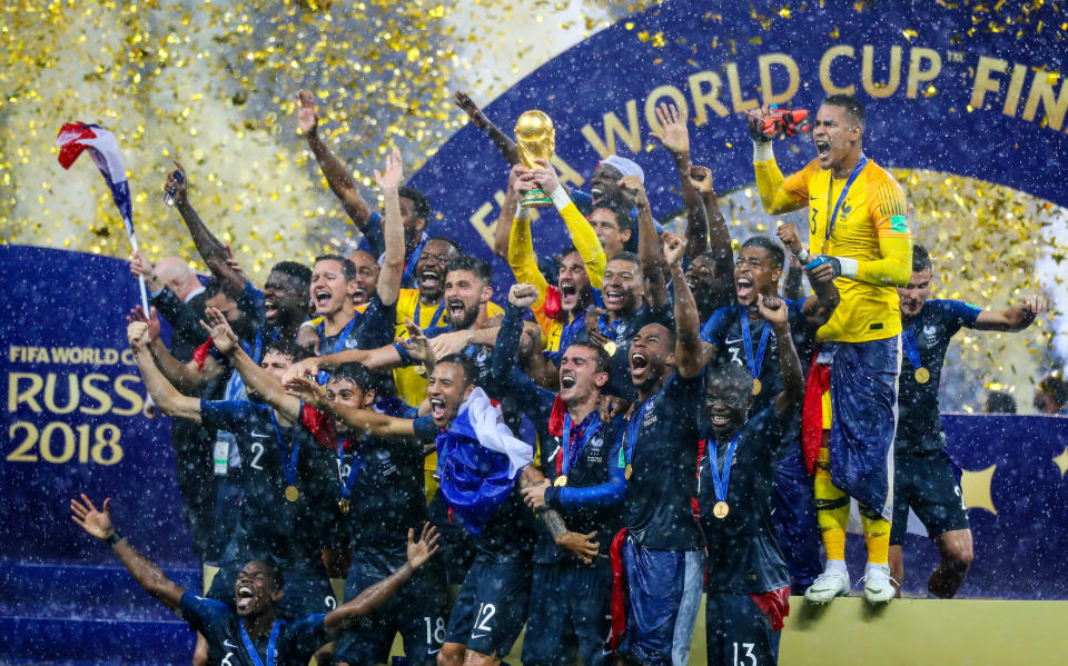 Seen here, members of the victorious France team celebrate after winning the 2018 FIFA World Cup trophy.