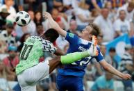 Soccer Football - World Cup - Group D - Nigeria vs Iceland - Volgograd Arena, Volgograd, Russia - June 22, 2018 Nigeria's John Obi Mikel in action with Iceland's Jon Dadi Bodvarsson REUTERS/Toru Hanai