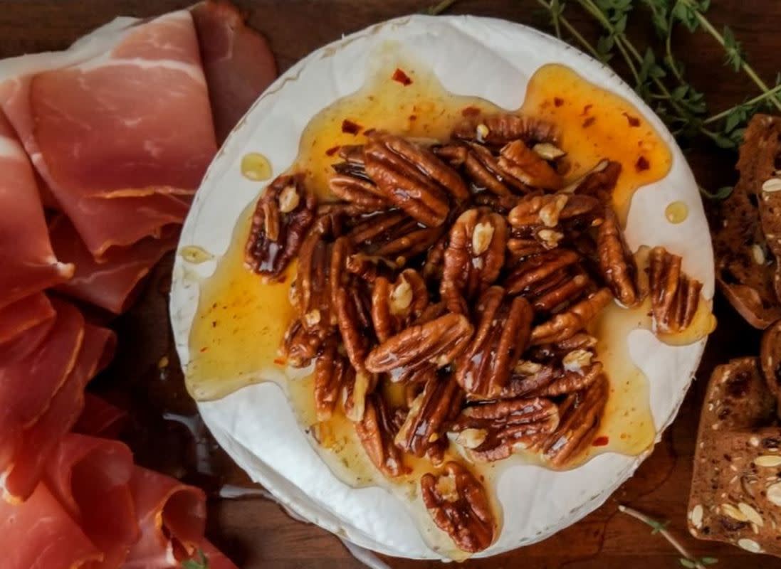 <p>Casual Foodist</p><p>This baked brie hits all the notes: creamy, salty, crunchy, sweet and spicy.</p><p><strong>Get the recipe: <a href="https://casualfoodist.com/baked-brie-with-hot-honey-pecans" rel="nofollow noopener" target="_blank" data-ylk="slk:Baked Brie With Hot Honey & Pecans;elm:context_link;itc:0;sec:content-canvas" class="link rapid-noclick-resp">Baked Brie With Hot Honey & Pecans</a></strong></p>