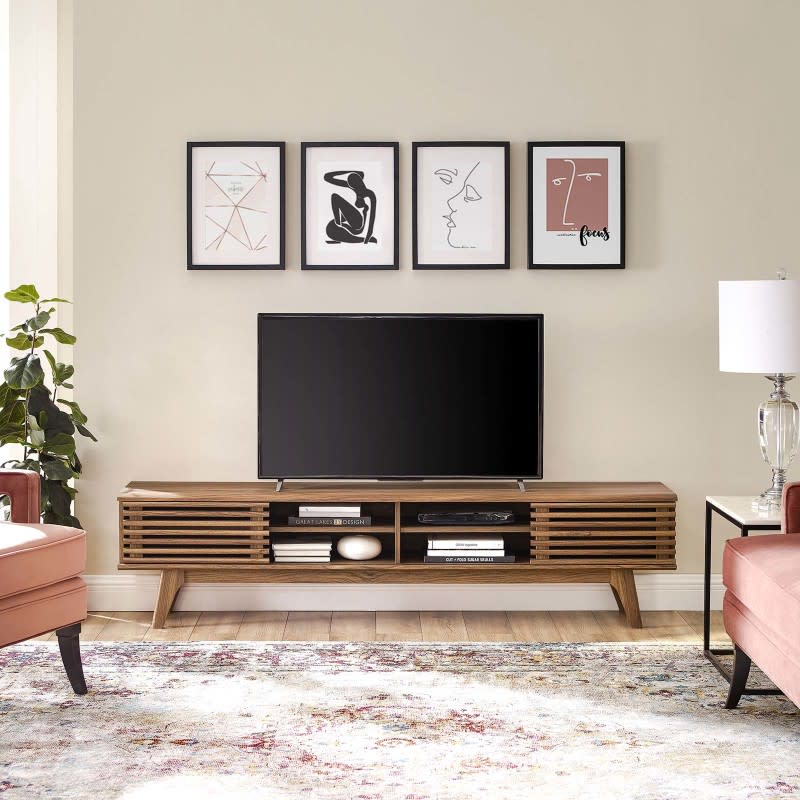 <p>HomeThreads</p><p>Go the extra mile and include a smart TV with access to streaming services, an alarm clock, and the Wi-Fi password. Set up a charging station is set up so they don't have to hunt for an outlet at bedtime. You can also include reading material from your personal collection or books that'll give them ideas of things to do in your city. </p><h3><a href="https://clicks.trx-hub.com/xid/arena_0b263_mensjournal?event_type=click&q=https%3A%2F%2Fgo.skimresources.com%2F%3Fid%3D106246X1712071%26url%3Dhttps%3A%2F%2Fwww.homethreads.com%2Fproducts%2Ffurniture%2Ftv-stands%2Feei-3303-wal-wal-render-70-entertainment-center-tv-stand&p=https%3A%2F%2Fwww.mensjournal.com%2Fpursuits%2Fhome-living%2Fdesign-a-welcoming-guest-bedroom%3Fpartner%3Dyahoo&ContentId=ci02cf8b0e90002444&author=Emily%20Fazio&page_type=Article%20Page&partner=yahoo&section=Bedroom&site_id=cs02b334a3f0002583&mc=www.mensjournal.com" rel="nofollow noopener" target="_blank" data-ylk="slk:Render 70" Entertainment Center TV Stand in Walnut Walnut by Modway;elm:context_link;itc:0;sec:content-canvas" class="link ">Render 70" Entertainment Center TV Stand in Walnut Walnut by Modway</a></h3><ul><li>70"L x 13.5"W x 17"H</li><li>Smooth walnut grain veneer</li><li>Four drawers for added storage</li></ul>