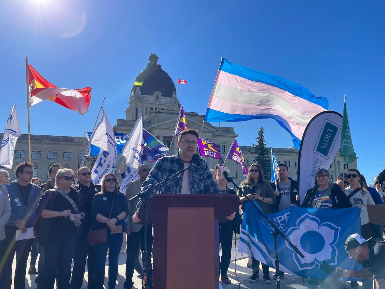 Kent Peterson, president of CUPE Saskatchewan, speaks in front of the Saskatchewan Legislature about 2SLGBTQ+ rights.  (Submitted by Kent Peterson - image credit)