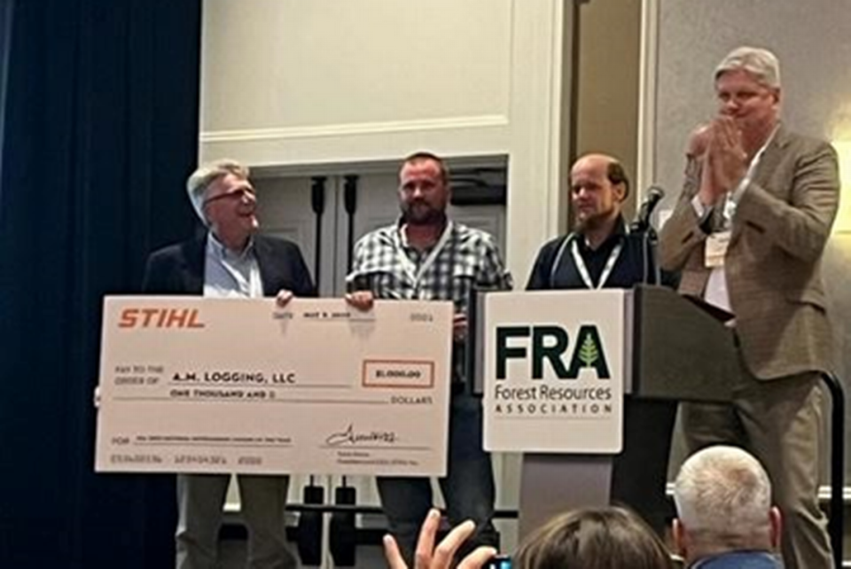 A.M. Logging LLC of Millheim is named the Forest Resources Association’s 2023 National Outstanding Logger on May 9 at the association’s annual meeting in Point Clear, Alabama. From left: Wes Miller, operations manager Andrew Miller and managing member Mark Byler accept a commemorative plaque from FRA Chairman Pete Stewart. They also received a check for $1,000 from Stihl. They plan to donate the check to Children’s Miracle Network Hospitals through Log A Load For Kids.