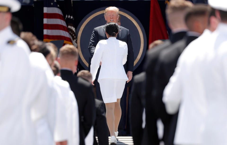 <p>President Donald Trump congratulates a female graduate at the commissioning and graduation ceremony for U.S. Naval Academy Class of 2018 at the Navy-Marine Corps Memorial Stadium in Annapolis, Md., May 25, 2018. (Photo: Kevin Lamarque/Reuters) </p>