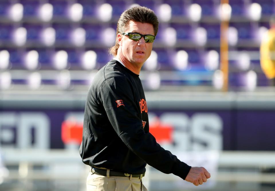 Good news: Mike Gundy’s mullet still exists, even though it’s been trimmed up. (Getty)