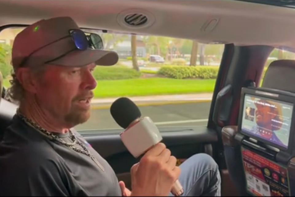 <p> Toby Keith/Tiktok</p> Toby Keith does karaoke in the back seat of an Uber.