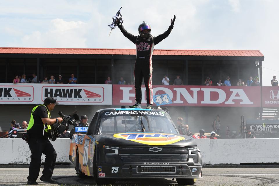 Parker Kligerman celebrates after winning a NASCAR Camping Truck Series race at Mid-Ohio.
