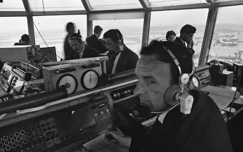 Air traffic controllers in the control tower at Heathrow Airport handling departing and arriving flights, 18th October 1964. (Photo by Randle/Mirrorpix/Getty Images)  - Getty