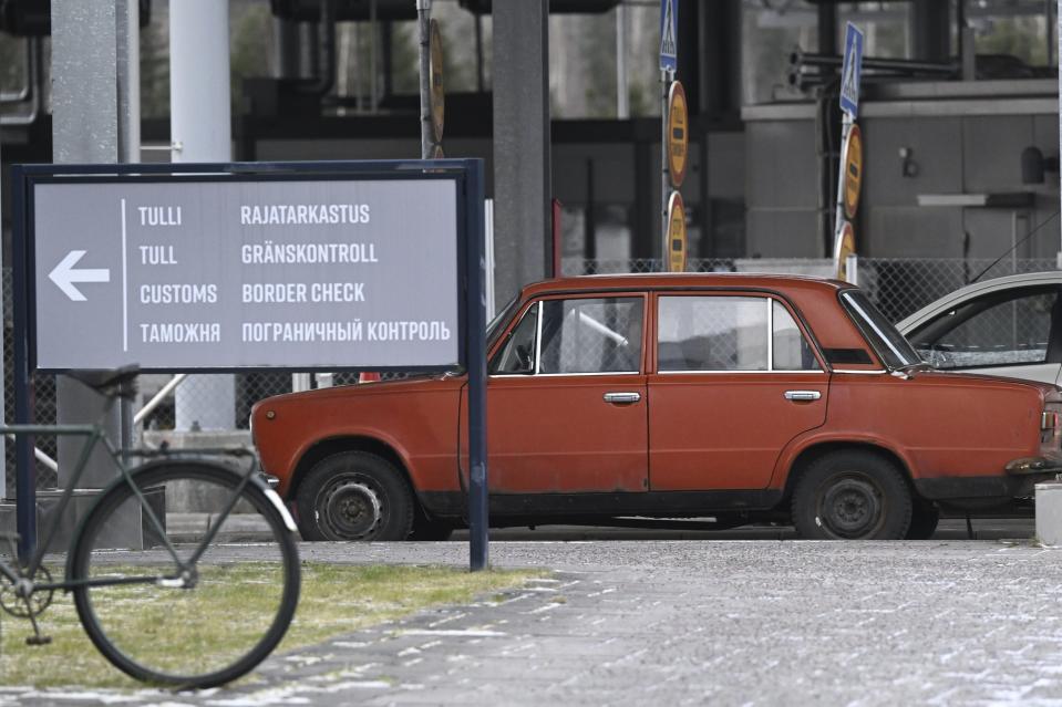 A car approaches the Nuijamaa border station between Russia and Finland in Lappeenranta, Finland, Thursday, Nov. 16, 2023. Finland’s government says it will close four crossing points on its long border with Russia to stop the flow of migrants that it accuses Moscow of ushering to the border in recent months. Finnish officials say they will be closed at midnight Friday on the land border that serves as the European Union’s external border. (Vesa Moilanen/Lehtikuva via AP)