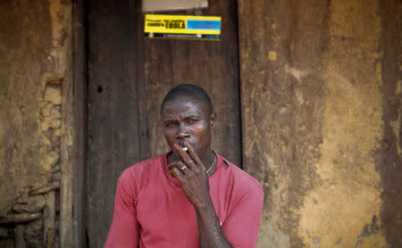 Etienne Ouamouno, father of Ebola patient zero, poses for a picture in Meliandou February 4, 2015. REUTERS/Misha Hussain