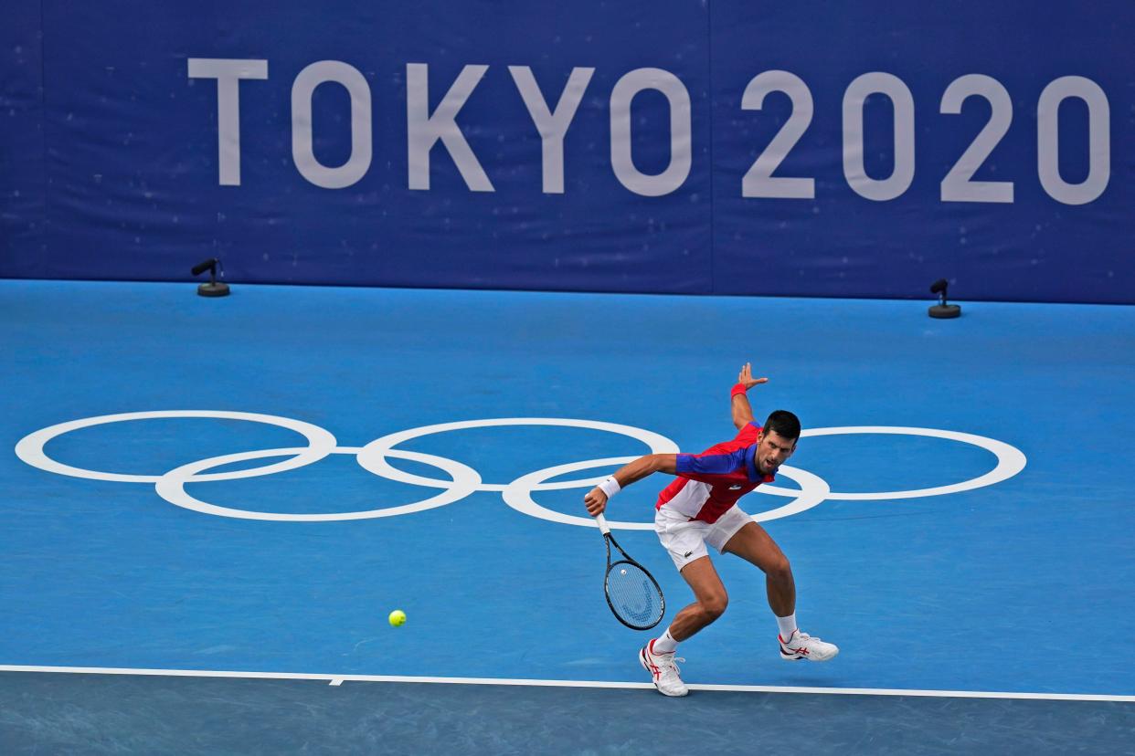 Novak Djokovick, of Serbia, plays Jan-Lennard Struff, of Germany, during the second round of the tennis competition at the 2020 Summer Olympics, Monday, July 26, 2021, in Tokyo, Japan.