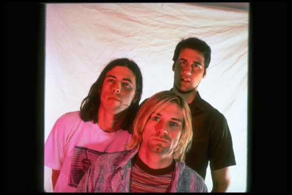 <p>Kurt Cobain with fellow Nirvana bandmates Krist Novoselic and Dave Grohl in 1993. They have sold over 25 million records in the United States and over 75 million records worldwide.</p>