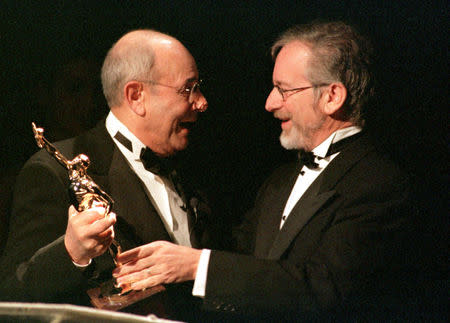 FILE PHOTO: Director-producer Stanley Donen (L) is presented with the coveted Ace Golden Eddie Filmmaker of the Year Award by Steven Spielberg during the 49th Annual Eddie Awards ceremonies March 13, in Beverly Hills./File Photo