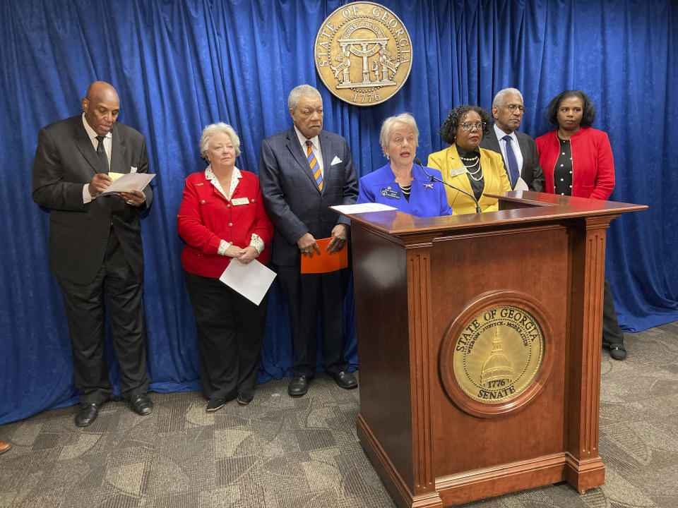 State Sen. Nan Orrock, D-Atlanta, flanked by supporters, announces federal complaints against Wellstar Health System, Wednesday, March 8, 2023, at the Georgia Capitol in Atlanta. Orrock says Wellstar violated federal anti-discrimination law and its nonprofit status when it closed Atlanta Medical Center in 2022. (AP Photo/Jeff Amy)